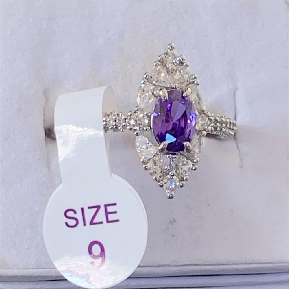 Bomb Party Light Tanzanite Cubic Zirconia on rhodium plating